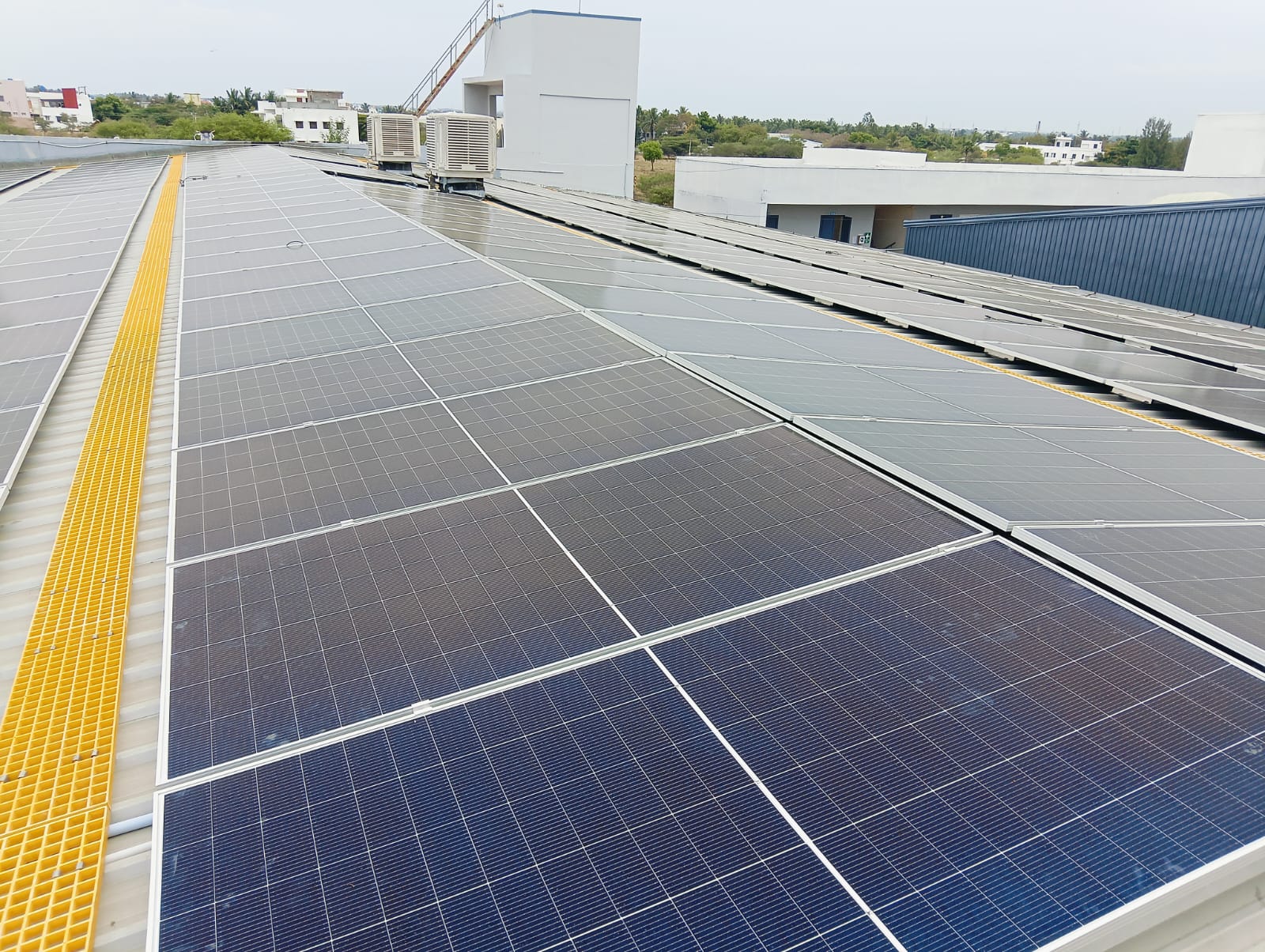 129 kWp GI-sheet rooftop — Kids Impex, Tiruppur, Tamil Nadu